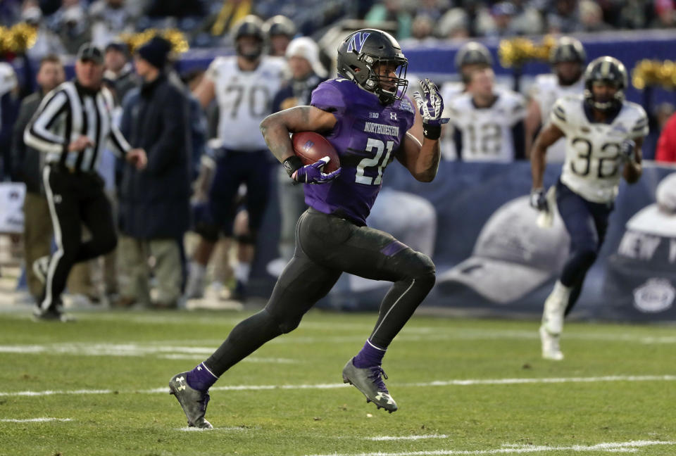 Northwestern’s Justin Jackson (21) is one of the best running backs in the Big Ten. (AP Photo/Julie Jacobson, File)