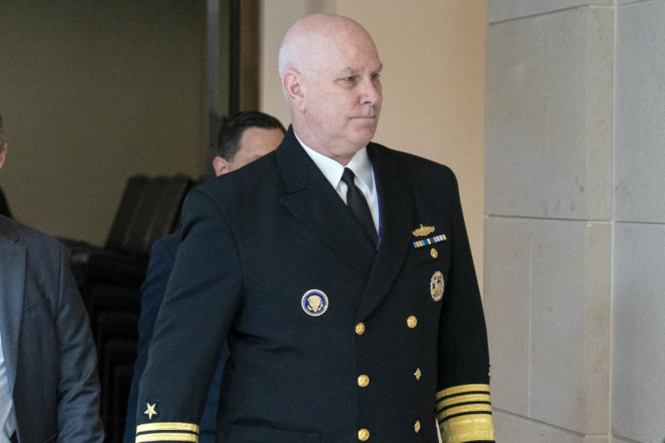 FILE - Vice Chairman of the Joint Chiefs, Adm. Christopher Grady, right, arrives for a closed door briefing about the leaked highly classified military documents, on Capitol Hill, April 19, 2023, in Washington. Grady says there's been no final decision on whether or not all U.S. troops will leave Niger and Chad. (AP Photo/Alex Brandon, File)