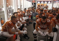 Texas Longhorns players listen to coaches in the locker room at half time during the game against the LSU Tigers Saturday Sept. 7, 2019 at Darrell K Royal-Texas Memorial Stadium in Austin, Tx. ( Photo by Edward A. Ornelas )