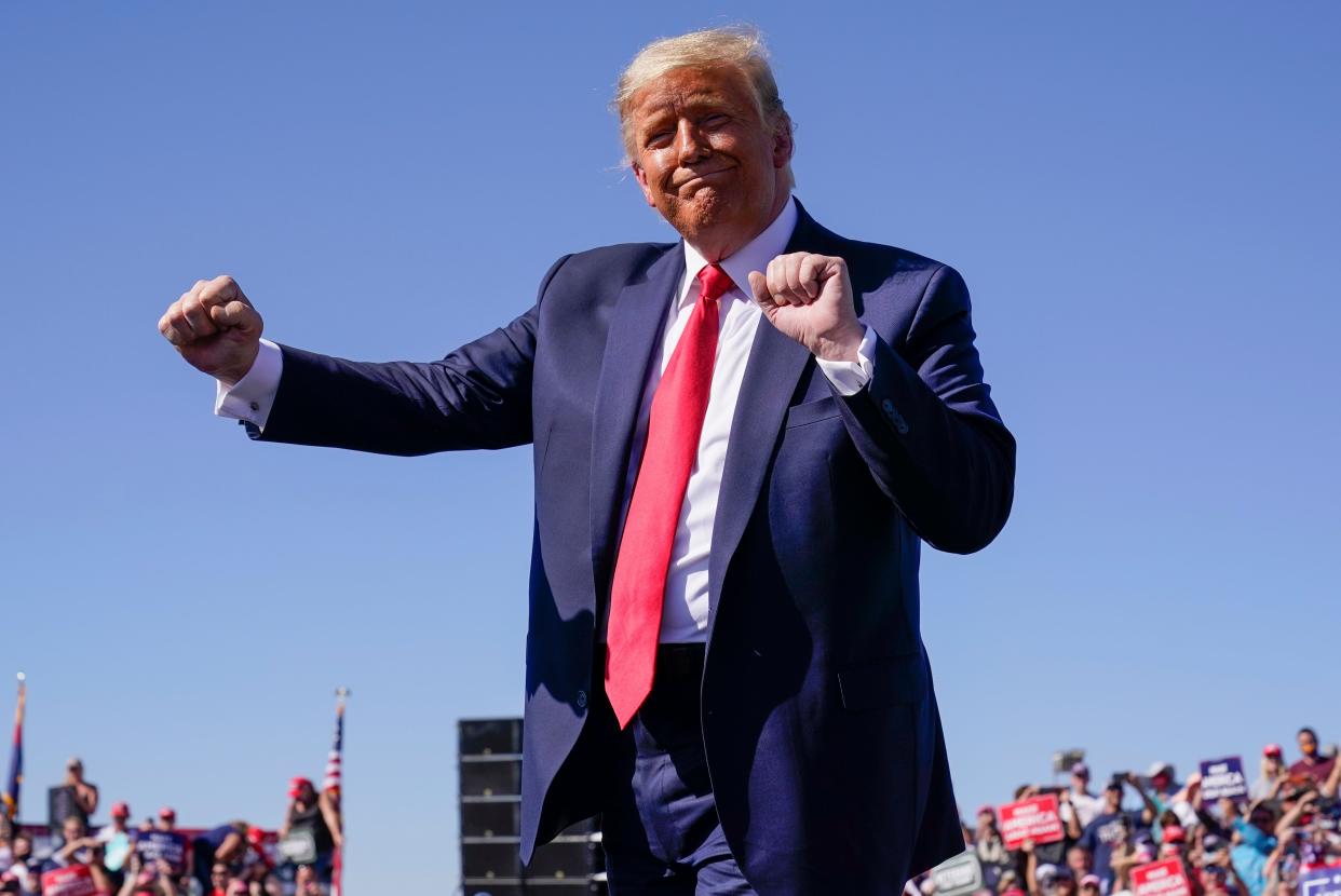 <p>Trump, pictured at a rally in Arizona last month, is considering holding another event this weekend, the New York Times reports</p> (AP)