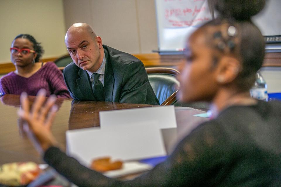 Superintendent Nikolai Vitti listens to students talk about their school concerns during the Student Leadership Development meeting at the Detroit Public Schools Community District headquarters in Detroit on Friday, May 10, 2019