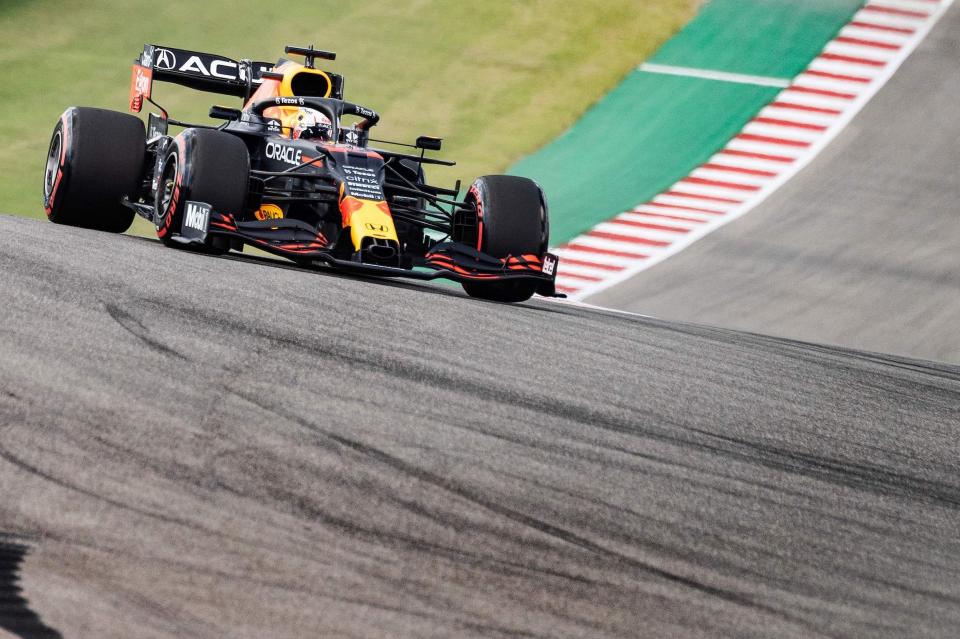 Red Bull's Dutch driver Max Verstappen takes a turn as he races during the qualifying session at the Circuit of The Americas in Austin, Texas