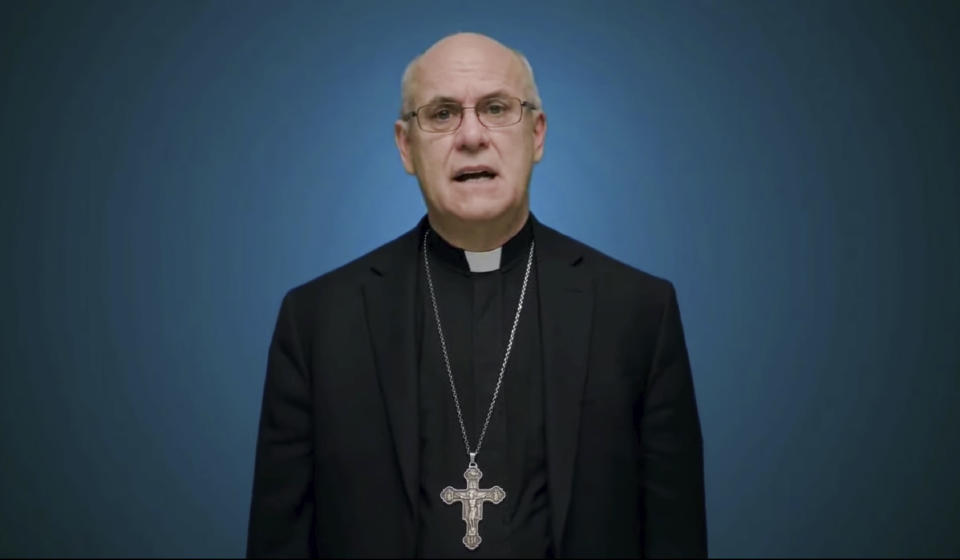 In this photo taken from video, Bishop Kevin Rhoades of Fort Wayne-South Bend, Ind., head of the doctrine committee for the U.S Conference of Catholic Bishops, addresses the body's virtual assembly regarding a formal statement on the meaning of the Eucharist in the life of the church on Thursday, June 17, 2021. (United States Conference of Catholic Bishops via AP)