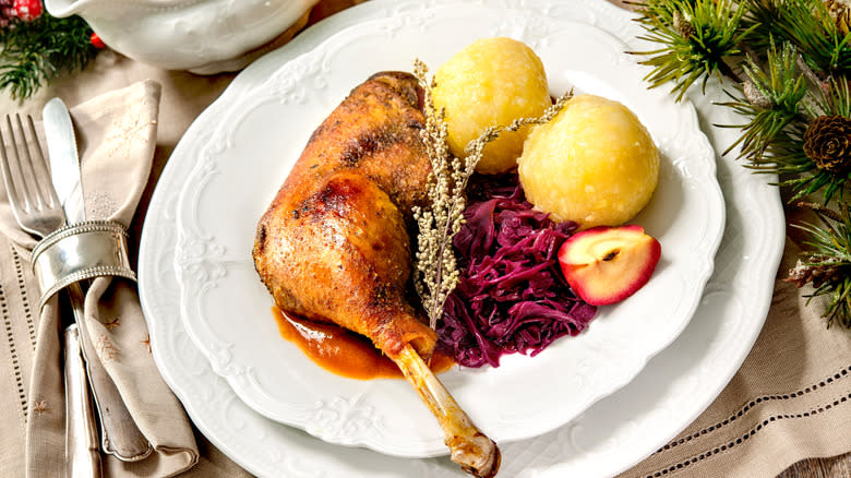 Roast goose leg with potatoes and sauerkraut