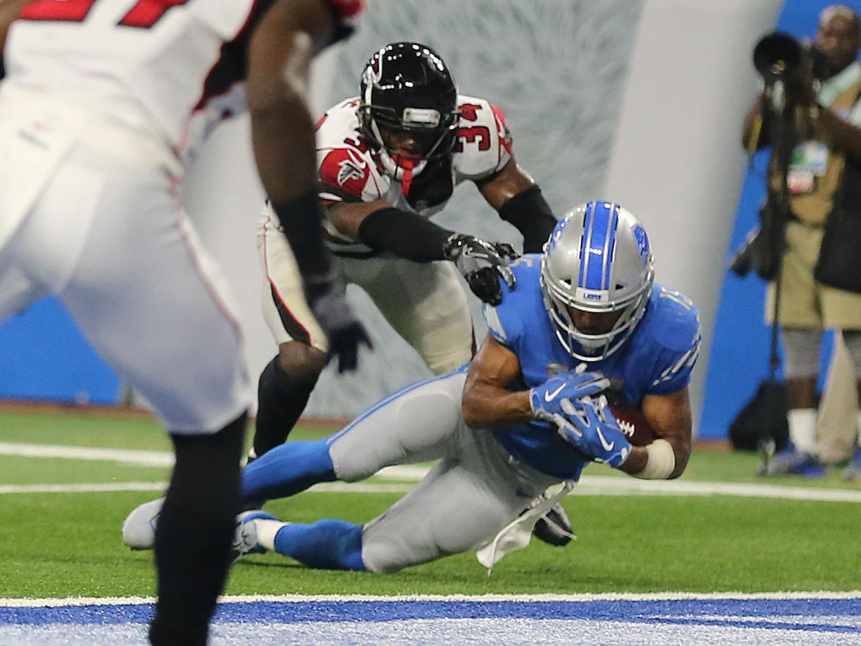 Golden Tate falls agonisingly short of the end zone to hand the Atlanta Falcons victory against the Detroit Lions: Getty