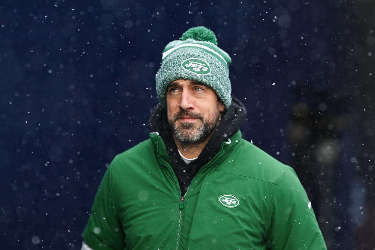 FOXBOROUGH, MA - JANUARY 7: Aaron Rodgers #8 of the New York Jets runs onto the field prior to the start of the game against the New England Patriots at Gillette Stadium on January 7, 2024 in Foxborough, Massachusetts. (Photo by Kathryn Riley/Getty Images)