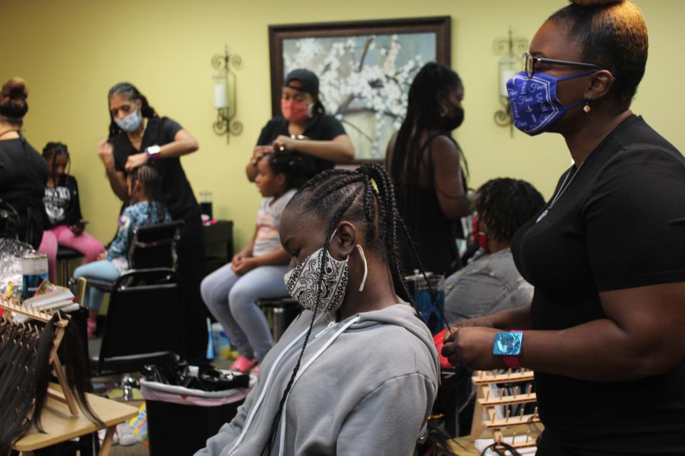A Twist of Greatness free hair braiding event