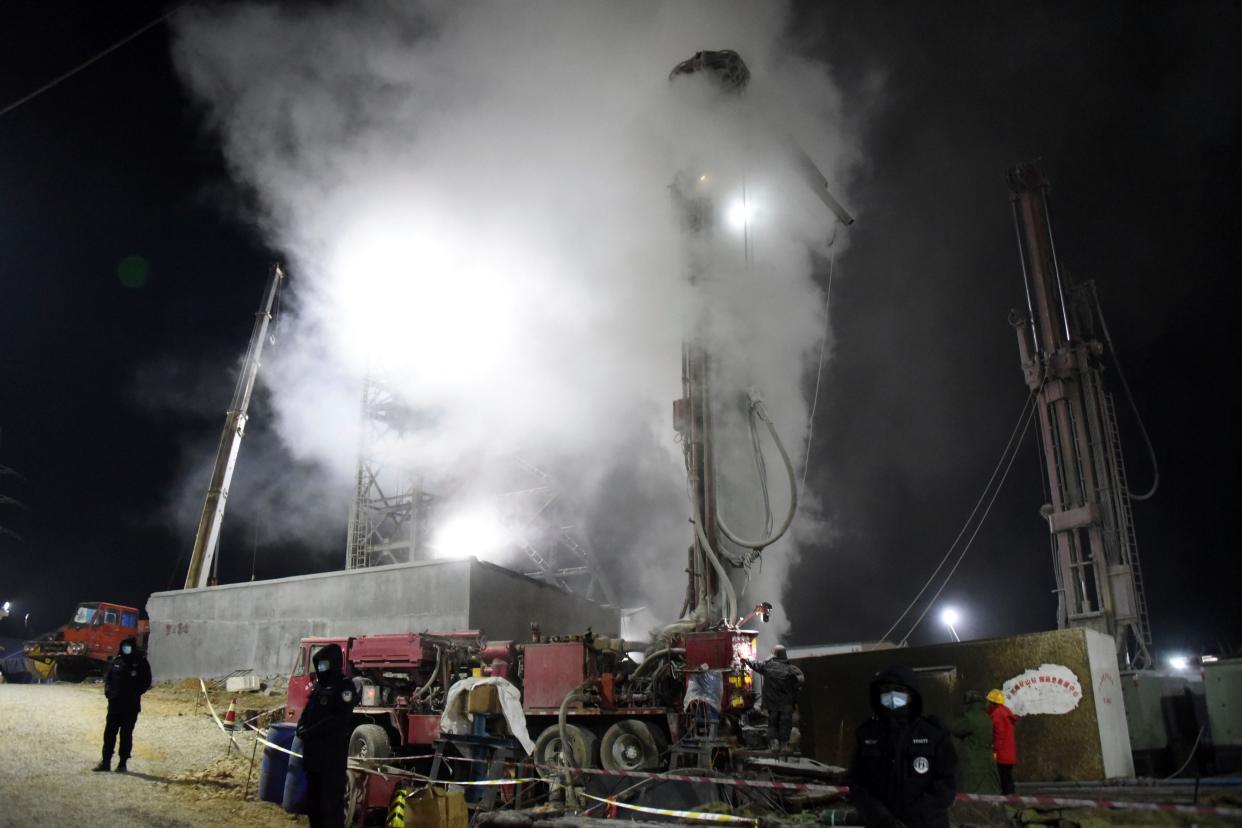 <p>Rescuers are drilling a shaft at the explosion site of a gold mine in Qixia, China to rescue the workers trapped underground</p> (AP)