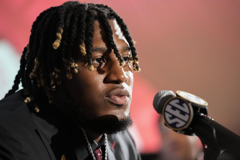 Alabama offensive lineman JC Latham responds to questions during NCAA college football Southeastern Conference Media Days, Wednesday, July 19, 2023, in Nashville, Tenn. (AP Photo/George Walker IV)