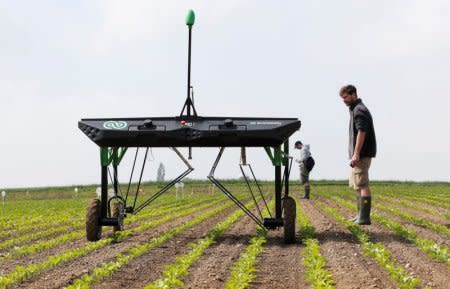 The prototype of an autonomous weeding machine by Swiss start-up ecoRobotix is pictured during tests on a sugar beet field near Bavois, Switzerland May 18, 2018. REUTERS/Denis Balibouse