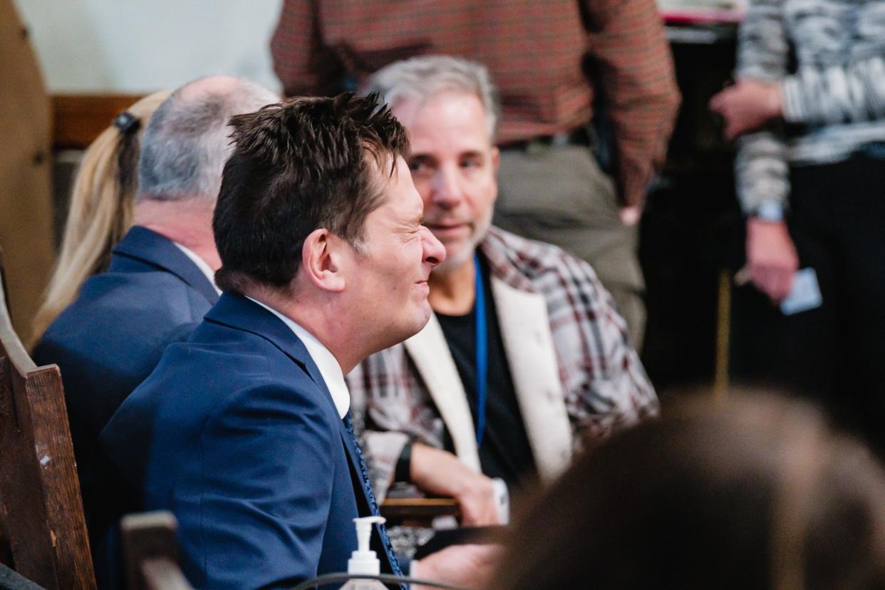 Former Carrollton schools Superintendent David Quattrochi winces Thursday shortly before his arraignment in front of Carroll County Common Pleas Judge Michael V. Repella II in the Carroll County Courthouse.