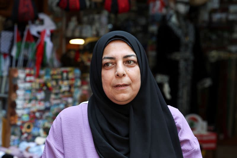 Bana Baalbaki attends an interview with Reuters at a market in the southern Lebanese port city of Sidon