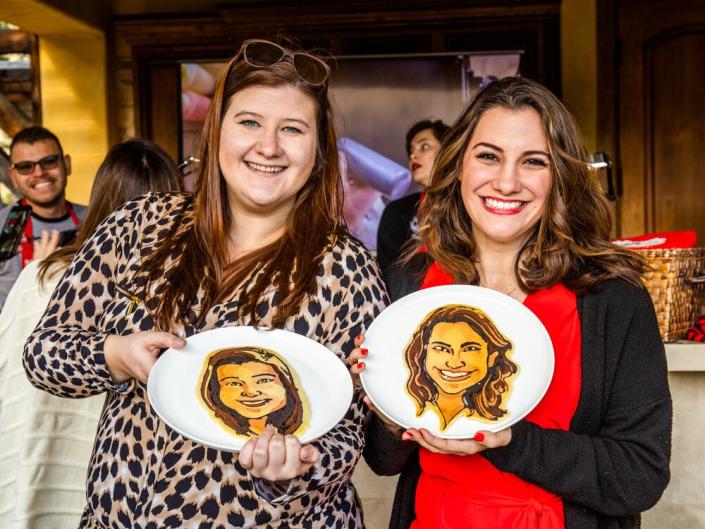 Winner Brittany Law (right) and guest show off their pancake portraits. | Sarah Crowder