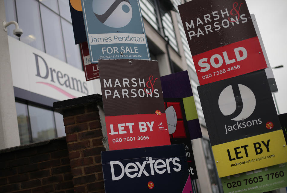 Various ‘for sale’, ‘sold’ and ‘let by’ estate agent signs juxtaposed next to a Dreams store in Clapham, London. Photo: Yui Mok/PA Images via Getty Images