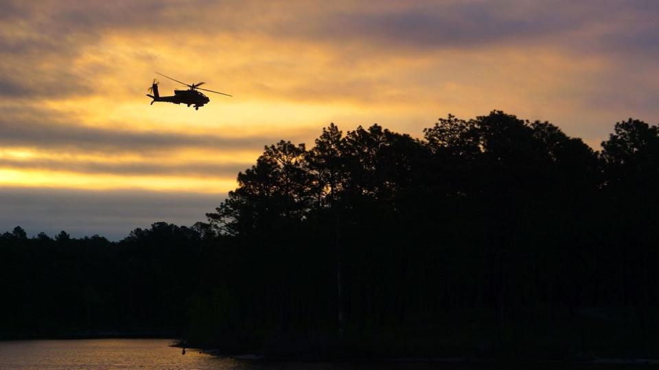 An AH-64 Apache from the 1st Battalion, 82nd Combat Aviation Brigade flies a reconnaissance mission in 2019 at Fort Bragg, North Carolina. (Maj. Richard Foote/Army)