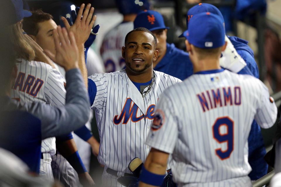 May 1, 2018; New York City, NY, USA; New York Mets left fielder Yoenis Cespedes (52) celebrates with teammates after hitting a solo home run against the Atlanta Braves during the sixth inning at Citi Field. Mandatory Credit: Brad Penner-USA TODAY Sports
