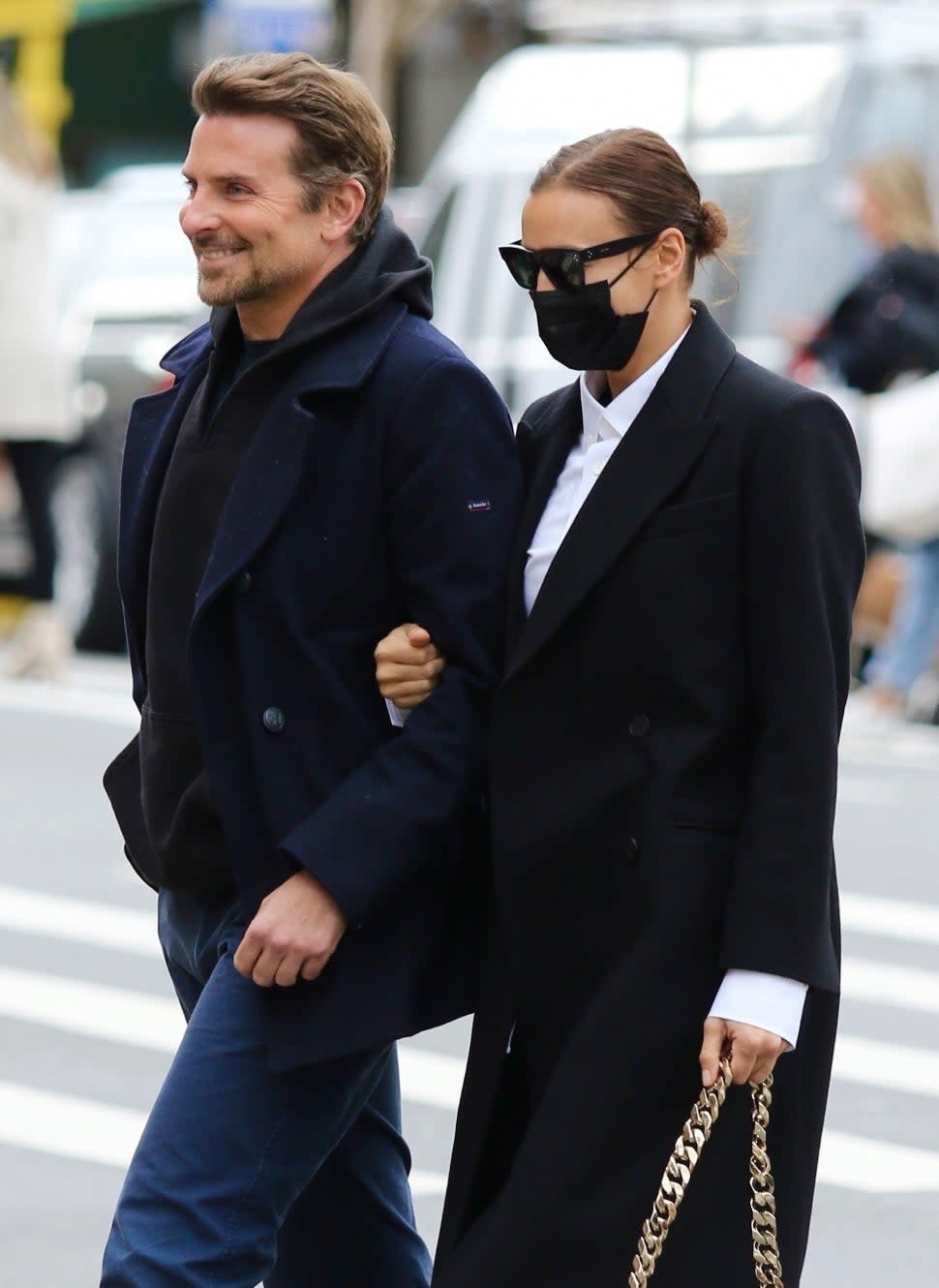 Bradley Cooper and Irina Shayk are all smiles walking arm-in-arm during a windy and chilly afternoon around Manhattan’s West Village area.