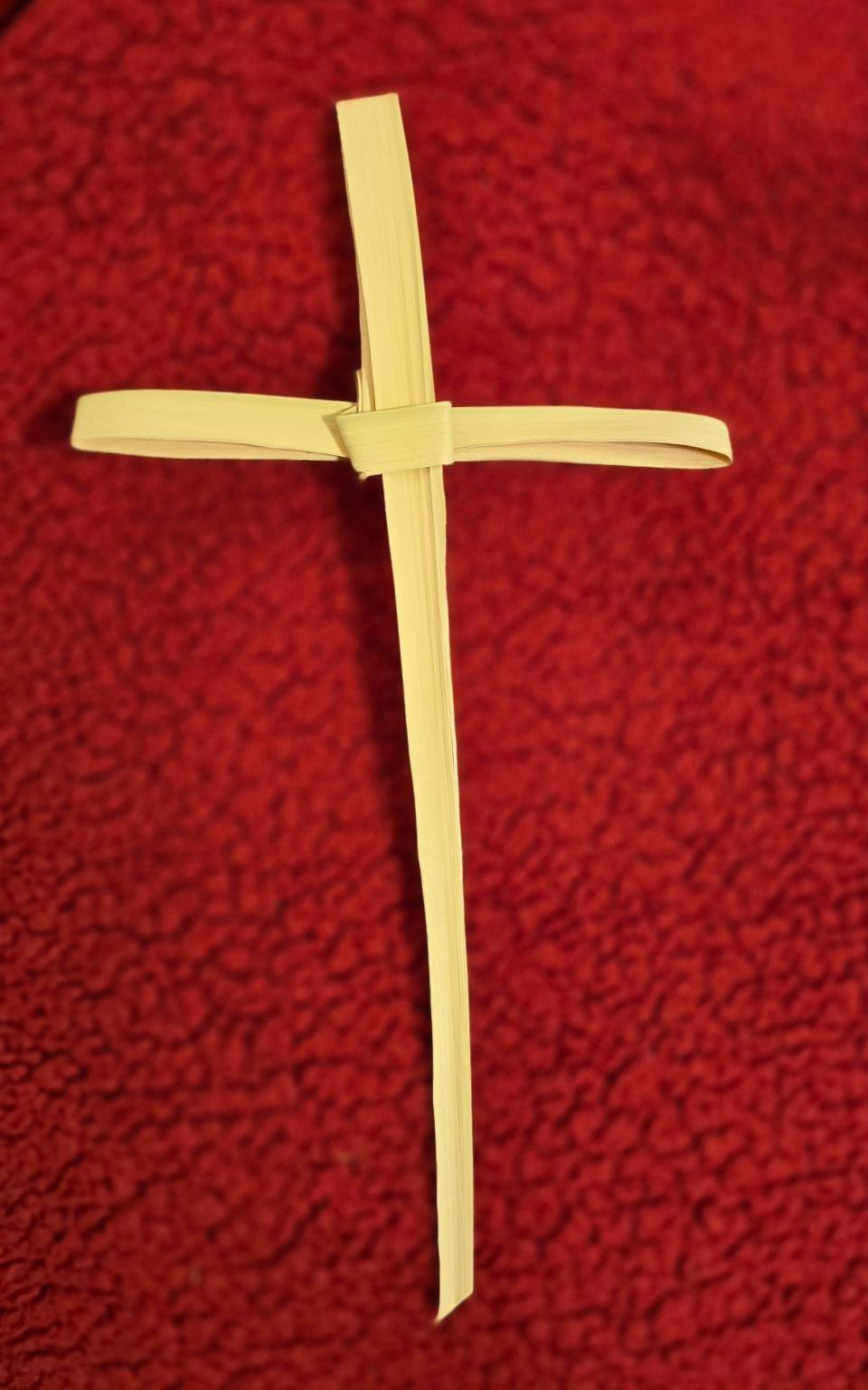 A Christian cross made of palm fronds is one of dozens made by members of Camp Ground United Methodist Church for its recent Palm Sunday observance. The church on Campground Road is also holding services for Maundy Thursday, Good Friday, Easter sunrise service and Sunday morning service.