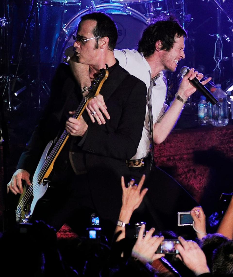 Robert DeLeo, left, and Scott Weiland of Stone Temple Pilots perform in 2008.