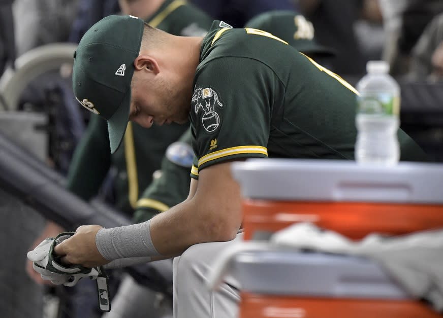 The heartbreak continues for the A’s following their MLB record eighth straight winner-take-all loss in the postseason. (AP)