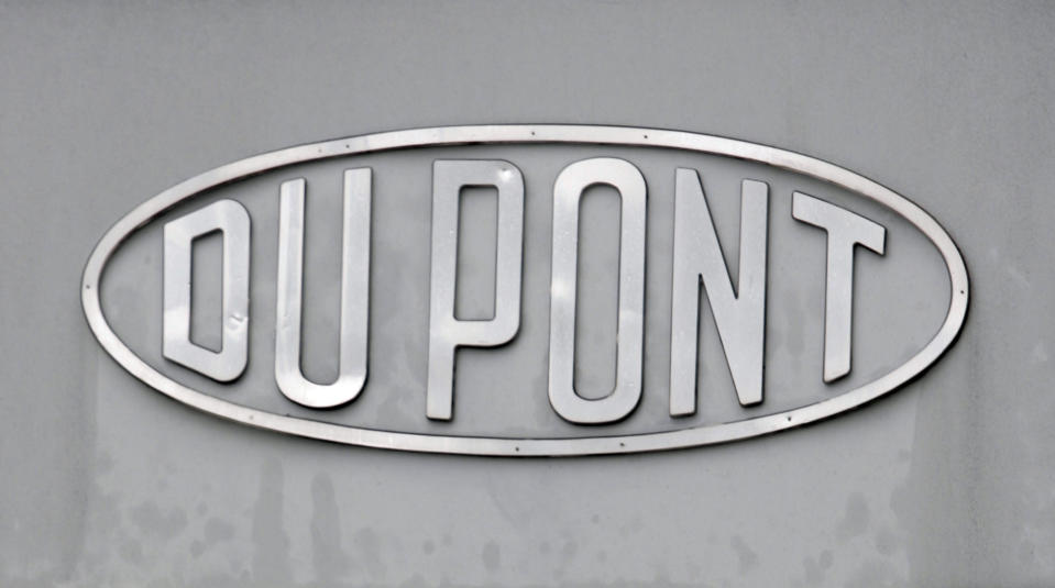 FILE - The DuPont logo is seen on a sign at the entrance to the company's Spruance Plant on April 22, 2008, in Richmond, Va. Three chemical companies, including DuPont, said Friday, June 2, 2023, that they had reached a $1.18 billion deal to resolve complaints of polluting many U.S. drinking water systems with potentially harmful compounds known as PFAS. (AP Photo/Steve Helber, File)