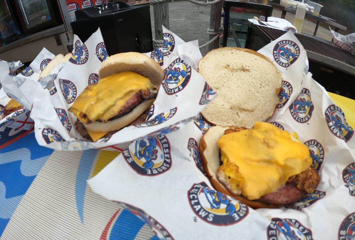 A Buster burger (left) and pork roll, egg and cheese sandwich at the new Taylor Pork Roll Boardwalk Eats stand at ShoreTown Ballpark in Lakewood, home of the Jersey Shore BlueClaws.