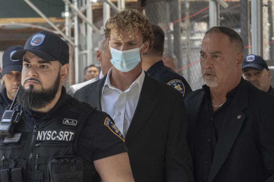 Daniel Penny leaves Manhattan Criminal Court on Friday, May. 12, 2023, in New York. Penny, 24, a U.S. Marine Corps veteran, appeared in court hours after turning himself in at a police station after prosecutors said they were charging him in connection with the May 1 death of Jordan Neely. (AP Photo/Jeenah Moon)