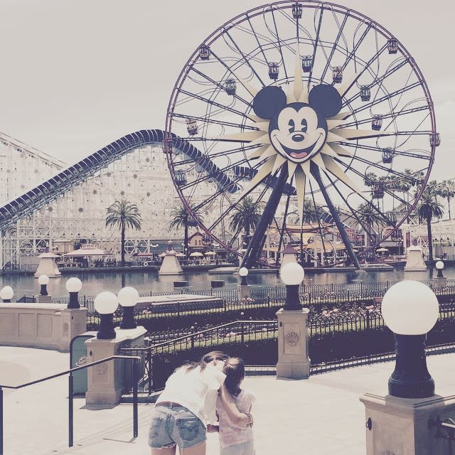 Disneyland brings out the inner child in everyone. That's certainly the case for 36-year-old Katie Holmes, who had a fun-filled day on Sunday at the happiest place on Earth with her daughter, 9-year-old Suri Cruise. Check out Katie enjoying the rides with the look of pure joy on her face. Splash News <strong>WATCH: Is Scientology Keeping Tom Cruise From Seeing Suri?</strong> Decked out in casual jean shorts, Katie also Instagrammed about her day with her daughter. "Nothing like a day @disneyland #weareblessed," Katie wrote. Interestingly enough, today marks the three-year anniversary of the former <em>Dawson's Creek</em> star filing for divorce from Suri's father, 52-year-old Tom Cruise, in 2012. <strong>WATCH: Jamie Foxx Sets the Record Straight on Katie Holmes Dating Rumors</strong> Earlier this month, Tom made headlines when he was photographed with his assistant on the set of his new film <em>Mena</em>, who happens to bear a striking resemblance to Katie. Watch below: