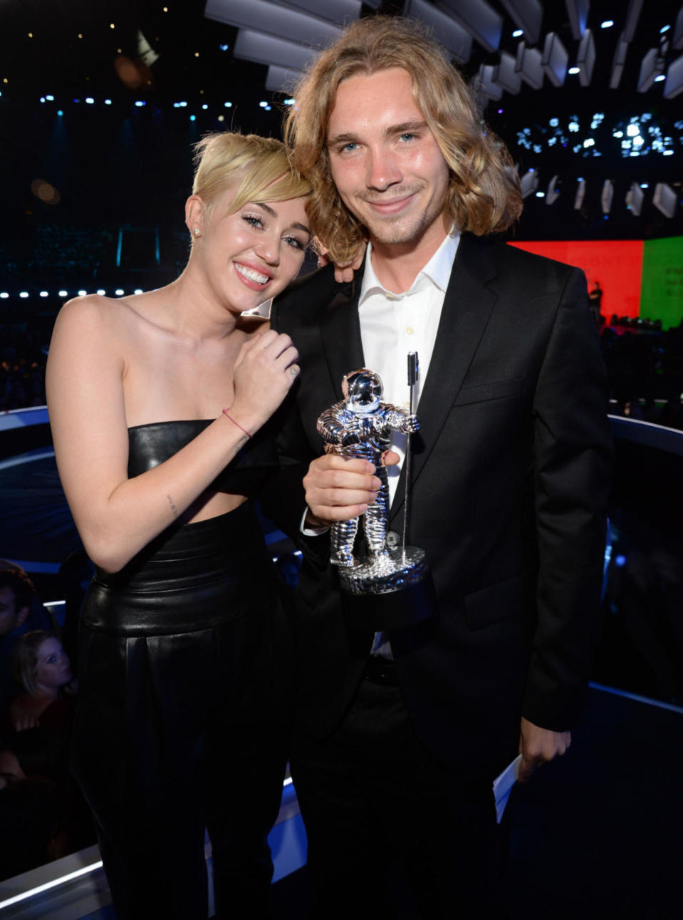 Miley Cyrus Is Speechless (2014) - A year after Twerkgate, Miley returned to the VMAs to accept a Video of the Year Moonman for “Wrecking Ball” and tried to class things up, using her time in the spotlight to draw awareness to an important issue: teen homelessness. Miley didn’t even give a speech, instead sitting on the edge of the stage in tears (real tears, not “Wrecking Ball”-video tears) while her date, a young homeless man named Jesse Helt, accepted the award on her behalf. Unfortunately, Miley was still unable to entirely avoid controversy, when it was revealed that Helt had a criminal past; his TV appearance prompted police to send out a warrant for his arrest for probation violation, and he was later sentenced to six months in jail. (Source: Getty Images)