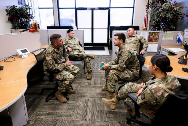 PHOTO: U.S. Army Sgt. First Class James Pulliam, left, commander of the recruiting station in Fountain, Colo.,, meets with recruiters on July 6, 2022. (Michael Ciaglo/The New York Times via Redux)