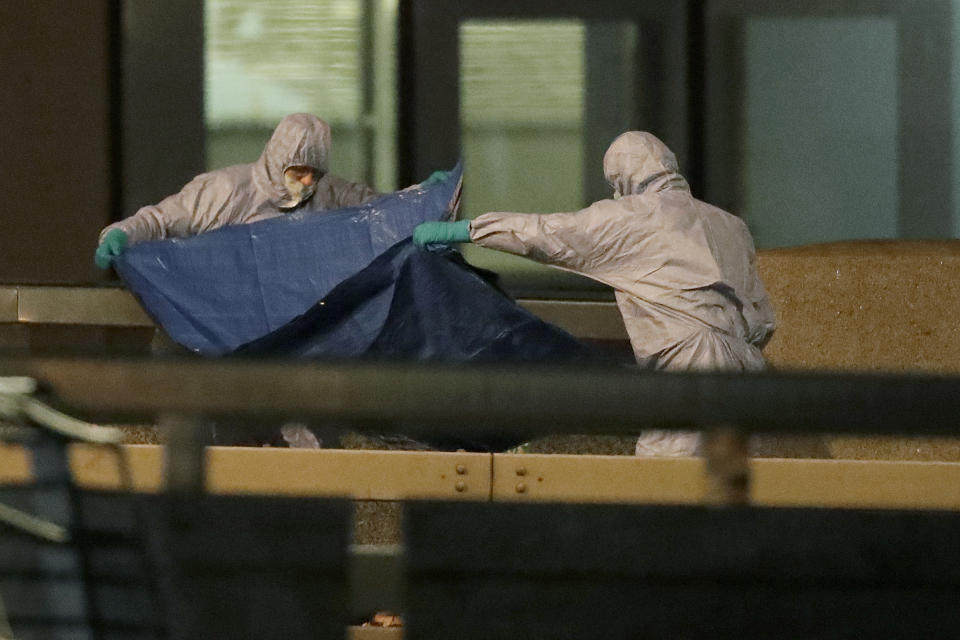 Police forensic officers where a terror suspect was killed on London Bridge. (AP Photo/Matt Dunham)