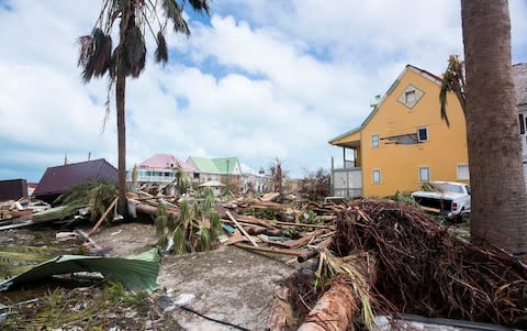 damage in Orient Bay on the French Carribean island of Saint-Martin - Credit: LIONEL CHAMOISEAU/AFP