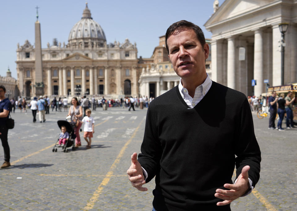 FILE - In this April 24, 2018 file photo, clergy sex abuse survivor and victim's advocate Juan Carlos Cruz, from Chile, is interviewed by The Associated Press, outside the Vatican's St. Peter's Square, in Rome, Tuesday, April 24, 2018. Pope Francis on Wednesday, March 24, 2021 named Cruz, who helped uncover a clerical sex abuse scandal, to a Vatican commission which advises the pontiff on how to protect children from pedophile clergy. (AP Photo/Andrew Medichini, file)