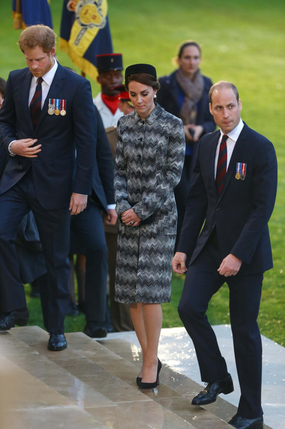 <p>For a second Somme commemoration, Kate chose a long grey Missoni coat stitched to resemble snakeskin. A vintage pillbox hat and faux pearl Balenciaga earrings completed the look.</p><p><i>[Photo: PA]</i></p>