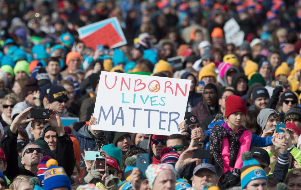 Pro-life supporters gather at the Washington Monument to hear Vice President Mike Pence speak at the March for Life rally on January 27, 2017 in Washington, DC.