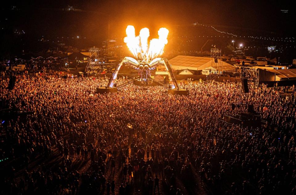 Chemical Brothers perform beneath the Arcadia spider at Glastonbury Festival (PA)