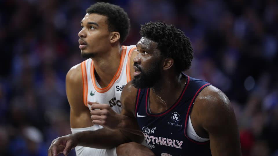 Future and present: Wembanyama and Embiid face off during the game. - Matt Slocum/AP