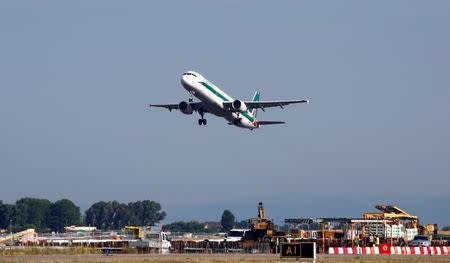 An Alitalia airplane takes off from the Leonardo da Vinci-Fiumicino Airport in Rome, Italy, June 21, 2018. REUTERS/Stefano Rellandini