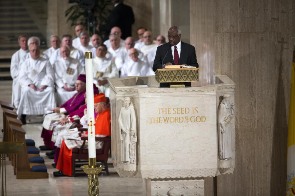 Clarence Thomas reads a passage