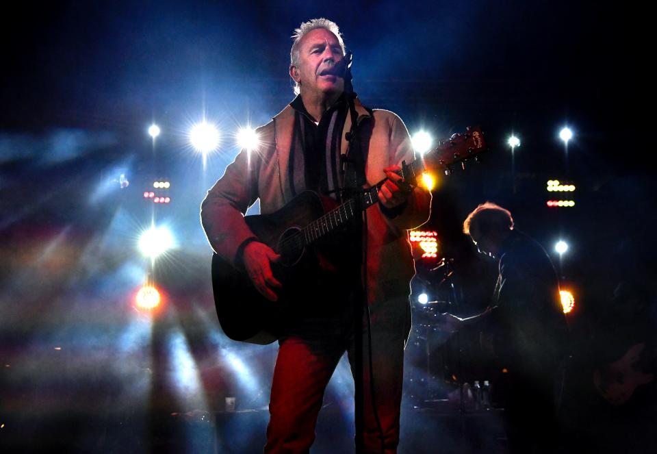 Actor Kevin Costner performs with his band Modern West at the 2021 Outlaws & Legends music festival