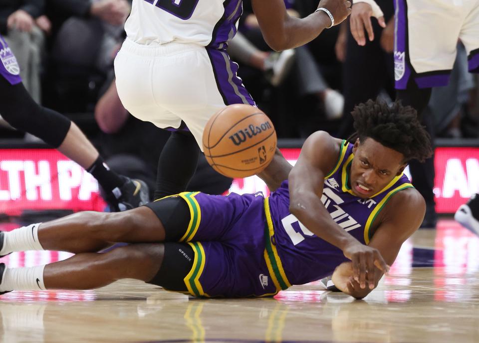 Utah Jazz guard Collin Sexton (2) gets tangled up with Sacramento Kings guard <a class="link " href="https://sports.yahoo.com/nba/players/6551" data-i13n="sec:content-canvas;subsec:anchor_text;elm:context_link" data-ylk="slk:Davion Mitchell;sec:content-canvas;subsec:anchor_text;elm:context_link;itc:0">Davion Mitchell</a> (15) in Salt Lake City on Wednesday, Oct. 25, 2023. | Jeffrey D. Allred, Deseret News