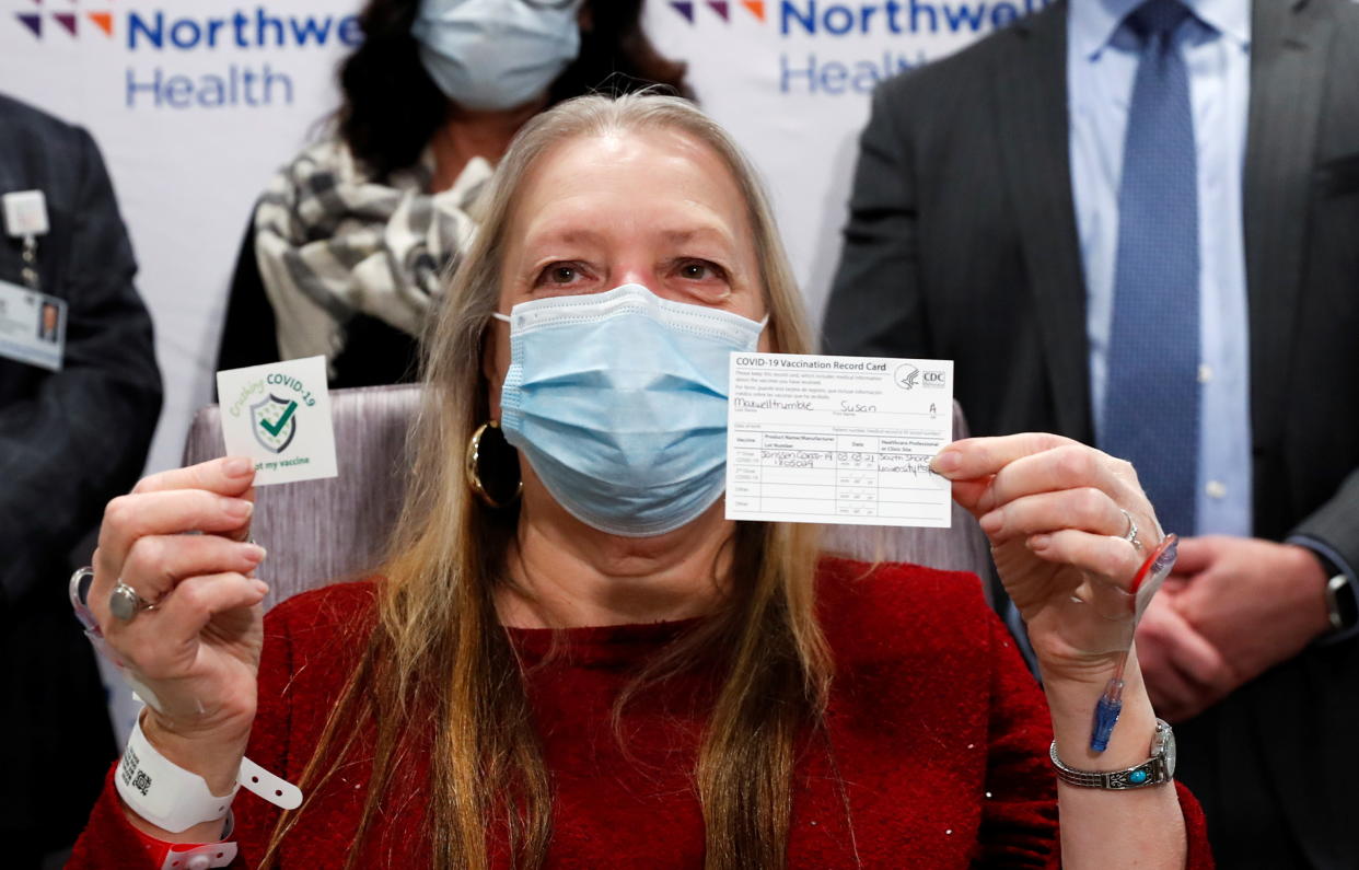 Susan Maxwell-Trumble, 67, holds her vaccination card after receiving the Johnson & Johnson's coronavirus disease (COVID-19) vaccine at Northwell Health's South Shore University Hospital in Bay Shore, New York, U.S., March 3, 2021. REUTERS/Shannon Stapleton