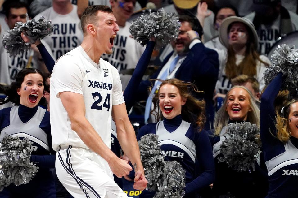 Xavier Musketeers forward Jack Nunge (24) reacts to a made basket and a foul in the first half of the 89th Annual Crosstown Shootout college basketball game against the Cincinnati Bearcats, Saturday, Dec. 11, 2021, at Cintas Center in Cincinnati. 