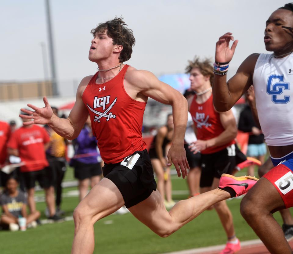 Lubbock-Cooper's Cal Ritz competes in the 100 meter dash during the District 4-5A track and field meet, Thursday, April 13, 2023, at Pirate Stadium in Woodrow.