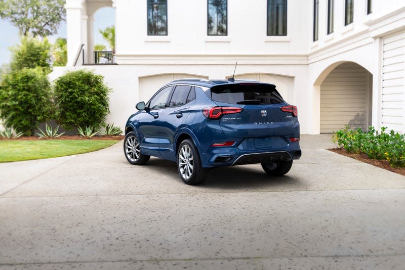 A blue 2024 Buick Encore GX Avenir.