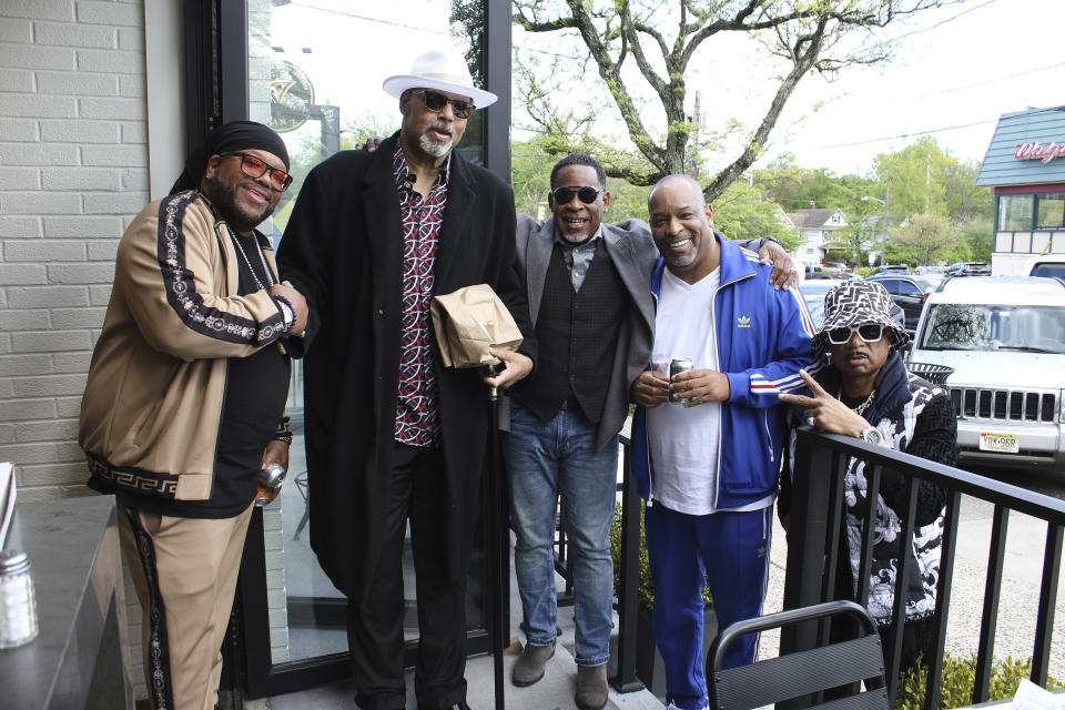 From left, DJ T Dynasty, Wonder Mike, Master Gee, Leland Robinson of Sugar Hill Records, son of Sylvia Robinson, Hen Dogg pose for a photograph in Englewood, N.J., Friday, May 5, 2023. In the five decades since hip-hop emerged out of New York City, it has spread around the country and the world. Among those who started to hear about it were some these men across the river in Englewood, N.J., who started making up rhymes to go along with the beats. In 1979, they auditioned as rappers for Sugar Hill Records. As The Sugarhill Gang, they put out “Rapper’s Delight” and introduced the country to a record that would reach as high as 36 on Billboard’s Top 100 chart list, and even make it to No. 1 in some European countries. (AP Photo/Noreen Nasir)