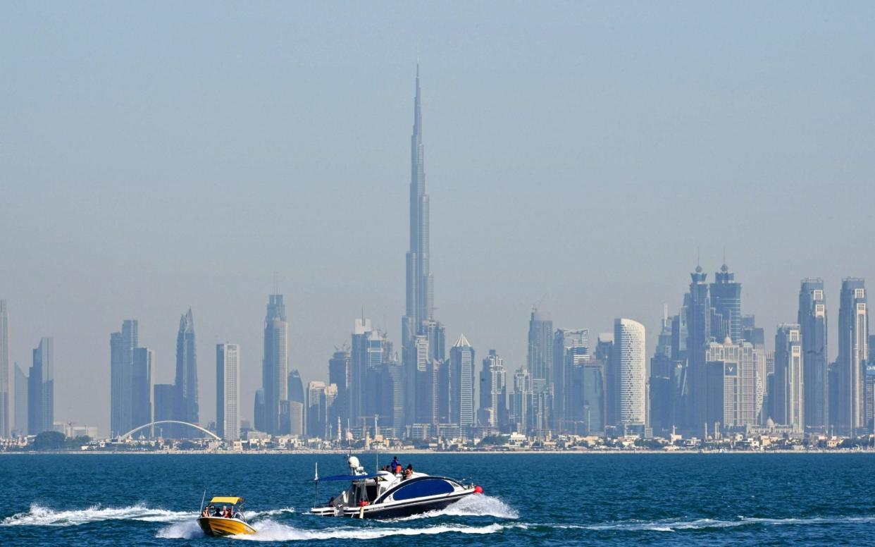 View of the skyline of the capital of Dubai in the United Arab Emirates, which is facing criticism over a controversial new nuclear power plant - AFP