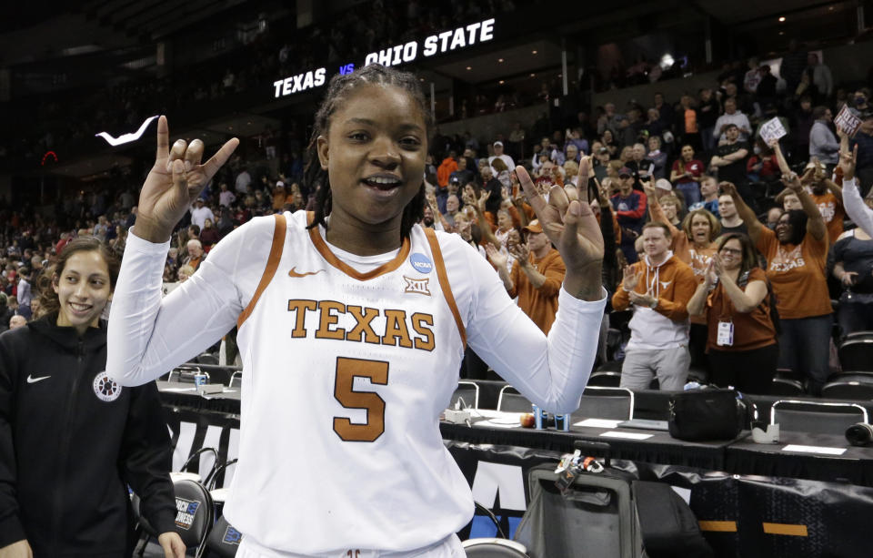 FILE - Texas forward DeYona Gaston (5) reacts after a college basketball game against Ohio State in the Sweet 16 round of the NCAA tournament, Friday, March 25, 2022, in Spokane, Wash. Texas won 66-63. Texas is ranked No. 3 in The Associated Press Top 25 women's preseason basketball poll released Tuesday, Oct. 18, 2022.(AP Photo/Young Kwak, File)