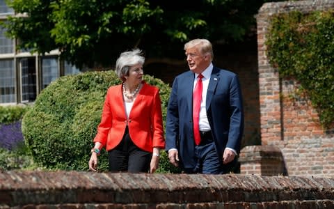 Theresa May with Donald Trump - Credit:  Pablo Martinez Monsivais/AP