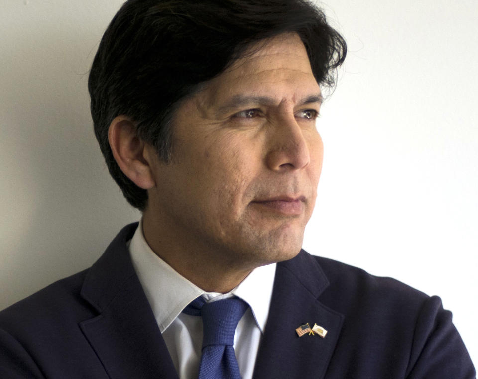 FILE - In this May 3, 2018, file photo, Kevin de Leon, D-Los Angeles, poses for photos in his campaign office in Los Angeles. Senate Majority Leader Mitch McConnell and Kevin de Leon, a Democrat in the California Senate, rarely have much in common. But they’re united in their condemnation this week of Sen. Dianne Feinstein. The top Democrat on the Senate Judiciary Committee, Feinstein is playing a central role in the battle over Brett Kavanaugh’s nomination to the Supreme Court. (AP Photo/Jae C. Hong, File)